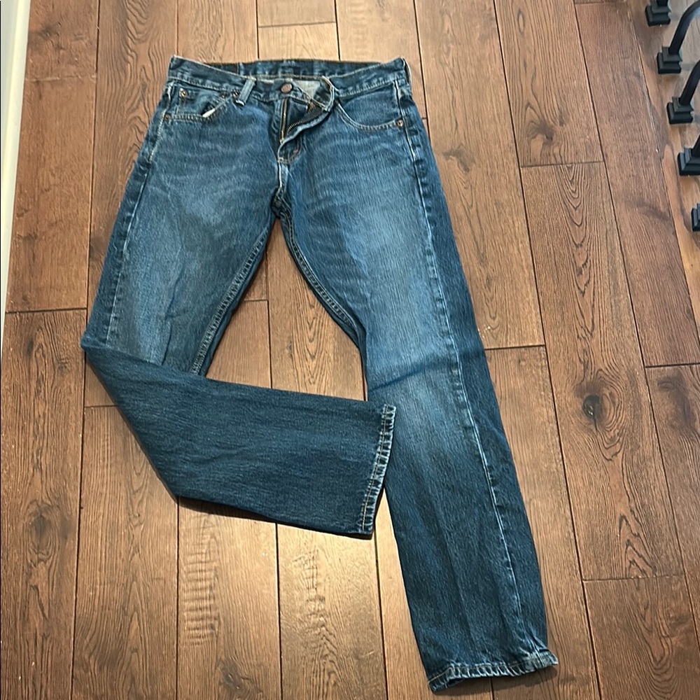 Levi's Classic Blue Straight Jeans with Distressed Finish
